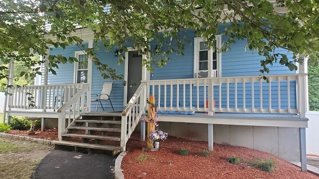 rear view of house with a deck