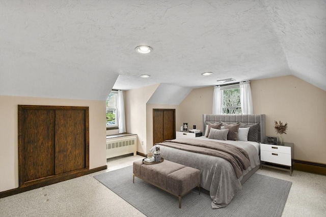 57 Strafford Rd, Westwood, MA 02090 - bedroom with radiator, lofted ceiling, a textured ceiling, baseboards, and recessed lighting