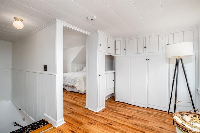 3 Lakeside Ave, Lunenburg, MA 01462 - bedroom with light wood-type flooring and wainscoting