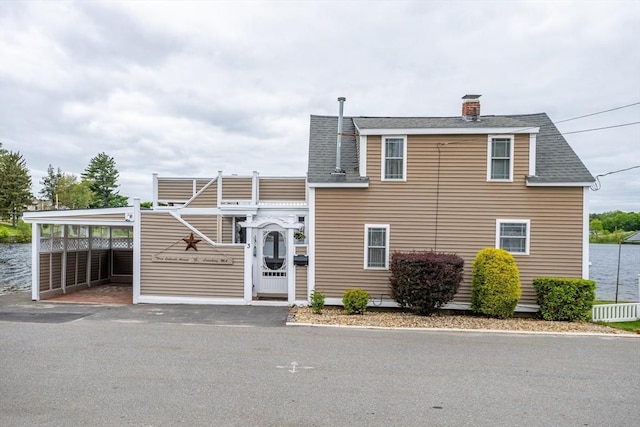 3 Lakeside Ave, Lunenburg, MA 01462 - view of front of house with roof with shingles and a chimney