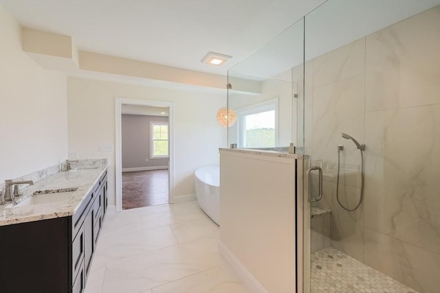 40 Blood Rd, Charlton, MA 01507 - bathroom with a shower with door, a freestanding bath, and double vanity