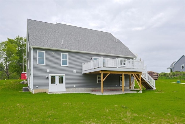 40 Blood Rd, Charlton, MA 01507 - back of house with a wooden deck, a yard, stairs, and roof with shingles