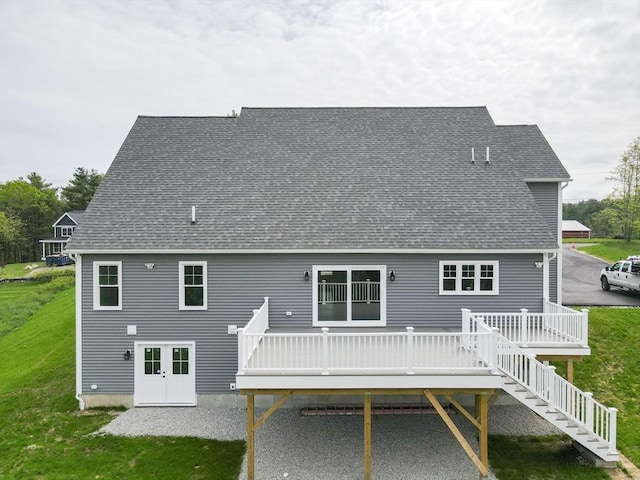 40 Blood Rd, Charlton, MA 01507 - rear view of property with a deck, a yard, a shingled roof, and stairs