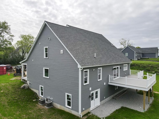 40 Blood Rd, Charlton, MA 01507 - back of house with a lawn, a wooden deck, and a shingled roof