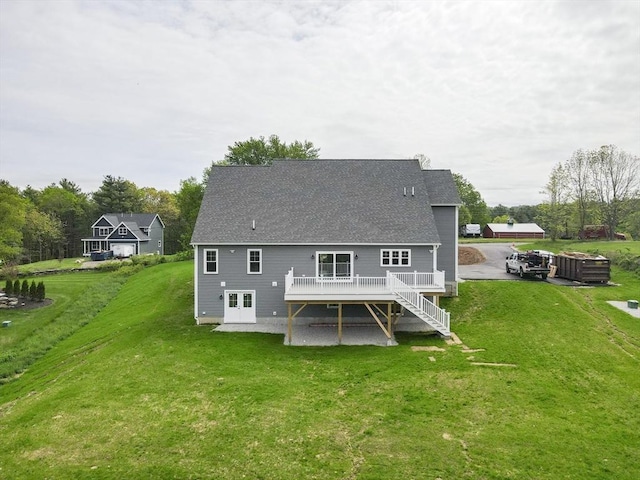 40 Blood Rd, Charlton, MA 01507 - rear view of property with a deck, a patio, a yard, and a shingled roof