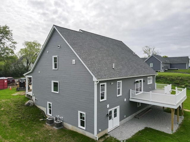 40 Blood Rd, Charlton, MA 01507 - back of house featuring a lawn, a deck, and roof with shingles