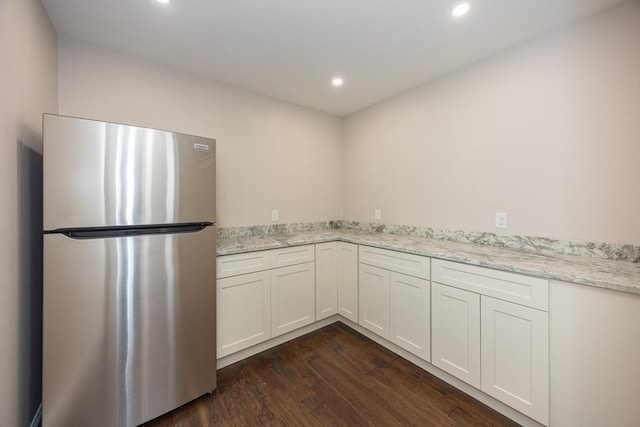 40 Blood Rd, Charlton, MA 01507 - kitchen with freestanding refrigerator, dark wood-style flooring, recessed lighting, and light stone counters