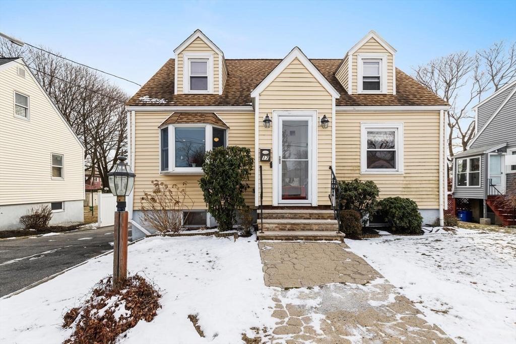 view of new england style home