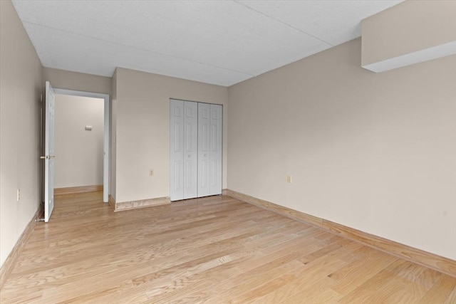 unfurnished bedroom featuring light hardwood / wood-style flooring