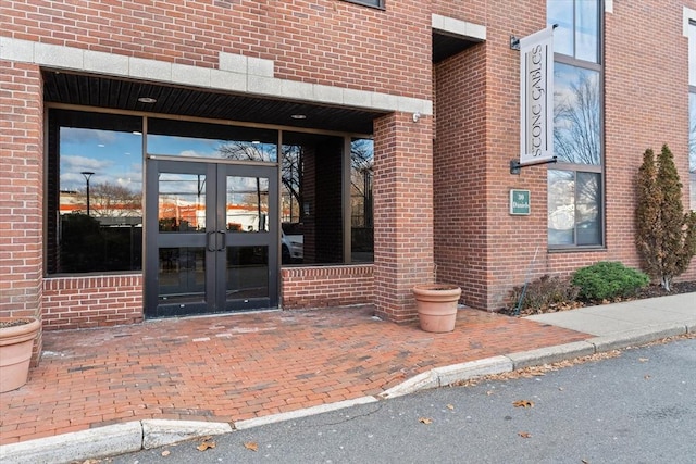 entrance to property featuring french doors