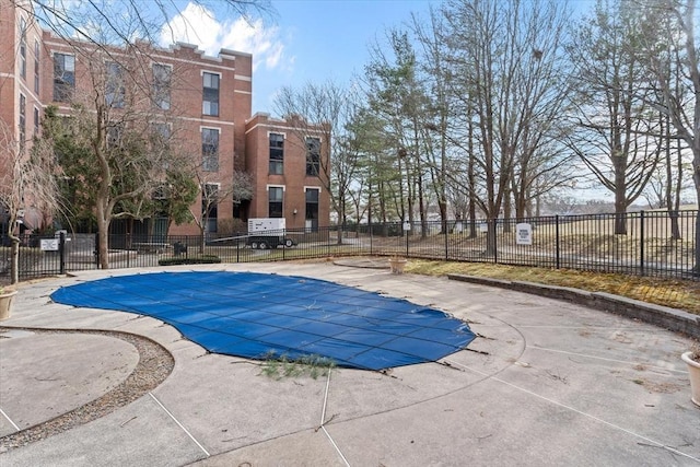 view of swimming pool featuring a patio