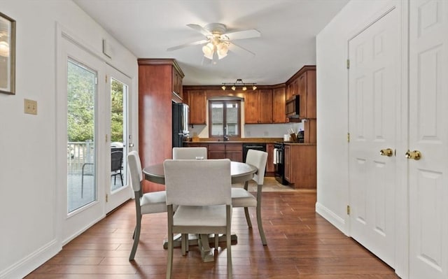 37 Saint Michaels Ave, Somerset, MA 02726 - dining room with ceiling fan, plenty of natural light, rail lighting, and dark wood-style floors