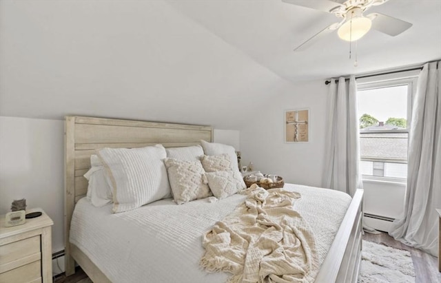 37 Saint Michaels Ave, Somerset, MA 02726 - bedroom with a baseboard radiator, vaulted ceiling, wood finished floors, baseboard heating, and a ceiling fan