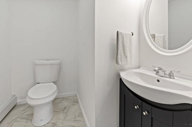 37 Saint Michaels Ave, Somerset, MA 02726 - bathroom with a baseboard heating unit, toilet, vanity, marble look tiles, and baseboards