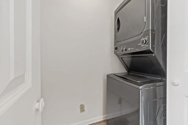 37 Saint Michaels Ave, Somerset, MA 02726 - laundry room with stacked washer / dryer and baseboards