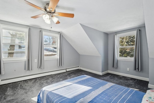 bedroom with baseboard heating, ceiling fan, vaulted ceiling, and dark colored carpet