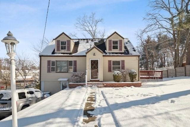 view of new england style home