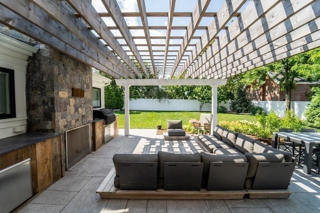 view of patio / terrace with outdoor dining area, grilling area, a fenced backyard, and a pergola