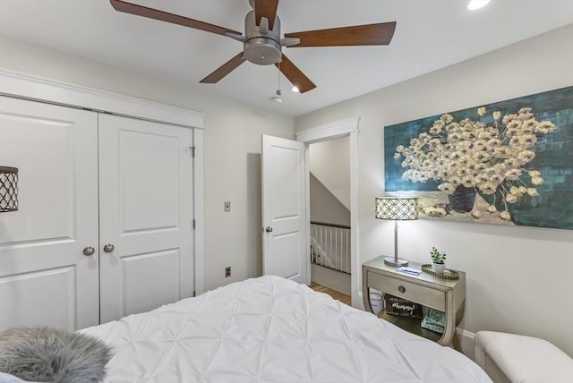 bedroom featuring a ceiling fan and a closet