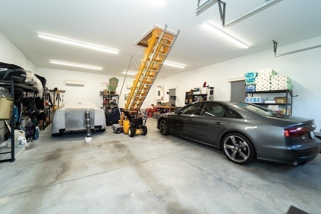 garage featuring an AC wall unit