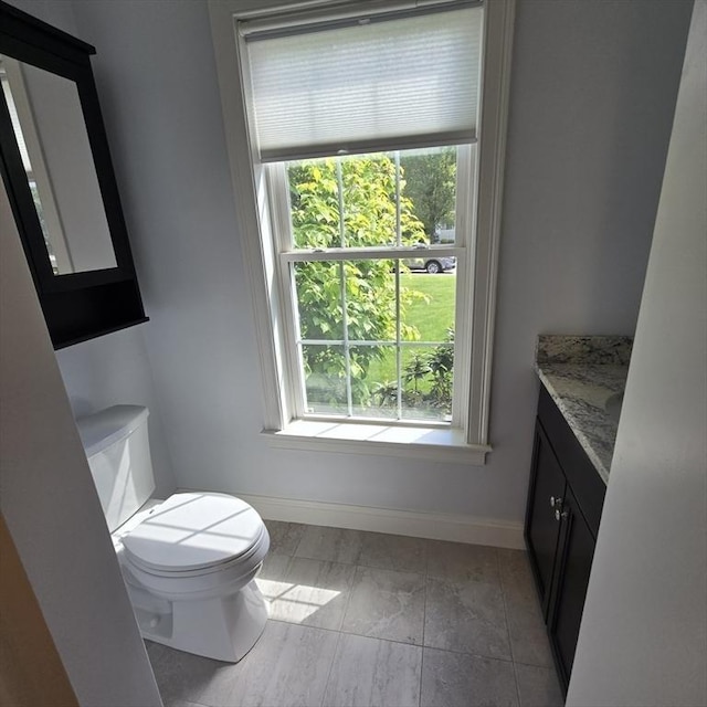 51 Alexandras Way, Brockton, MA 02301 - bathroom featuring vanity, baseboards, and toilet