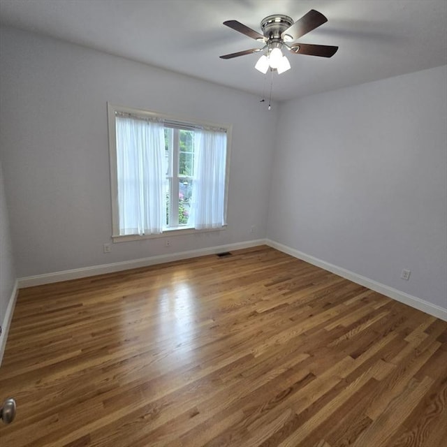 51 Alexandras Way, Brockton, MA 02301 - spare room featuring baseboards, wood finished floors, and ceiling fan