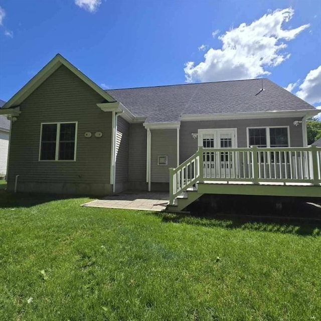 51 Alexandras Way, Brockton, MA 02301 - rear view of property with a wooden deck, a lawn, roof with shingles, and a patio area