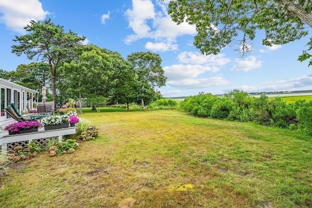 16 Gulls Cove Rd, Yarmouth, MA 02673 - view of grassy yard with a deck