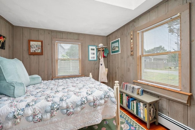 16 Gulls Cove Rd, Yarmouth, MA 02673 - bedroom featuring baseboard heating and wooden walls