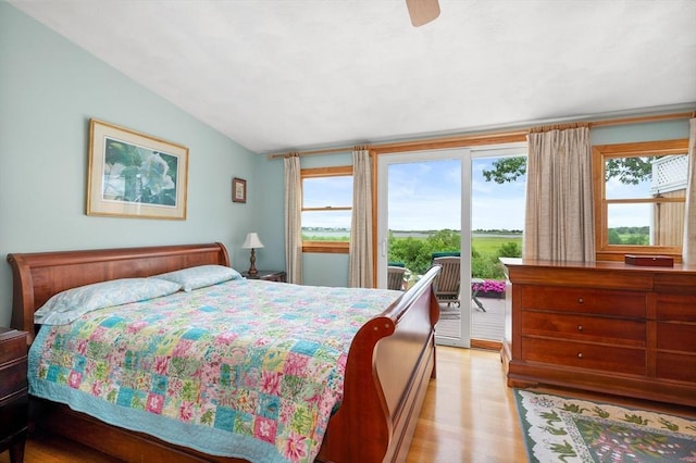 16 Gulls Cove Rd, Yarmouth, MA 02673 - bedroom featuring access to outside, vaulted ceiling, light wood-style floors, and a ceiling fan