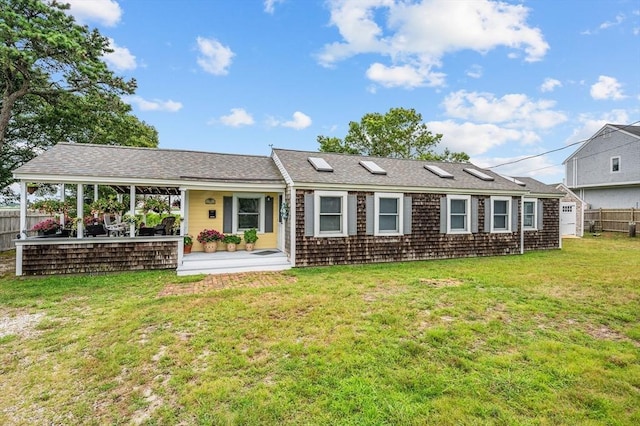 16 Gulls Cove Rd, Yarmouth, MA 02673 - view of front of home featuring a porch