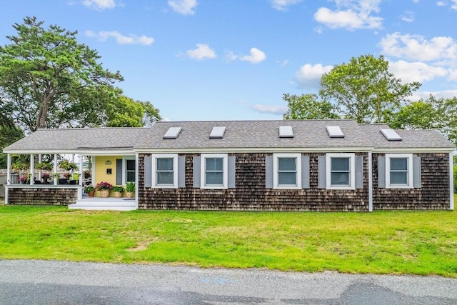 16 Gulls Cove Rd, Yarmouth, MA 02673 - ranch-style house with a front yard and a shingled roof