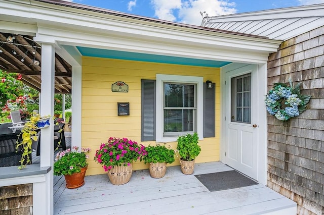 16 Gulls Cove Rd, Yarmouth, MA 02673 - doorway to property featuring a porch