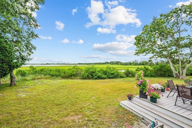 16 Gulls Cove Rd, Yarmouth, MA 02673 - view of grassy yard featuring a wooden deck