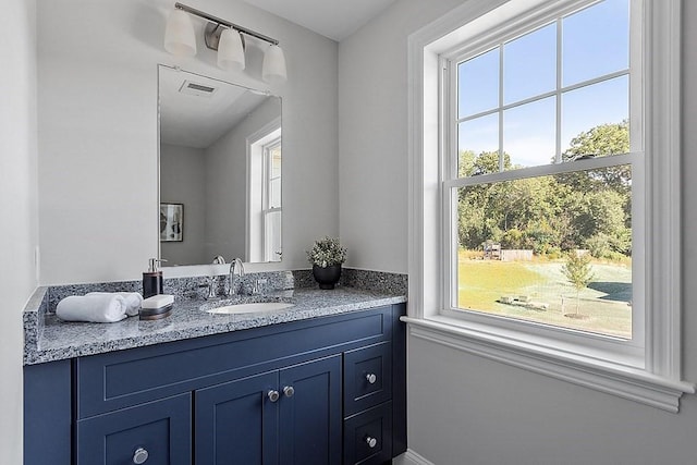 65 Palmetto Dr Unit 65, Bellingham, MA 02019 - bathroom featuring plenty of natural light and vanity