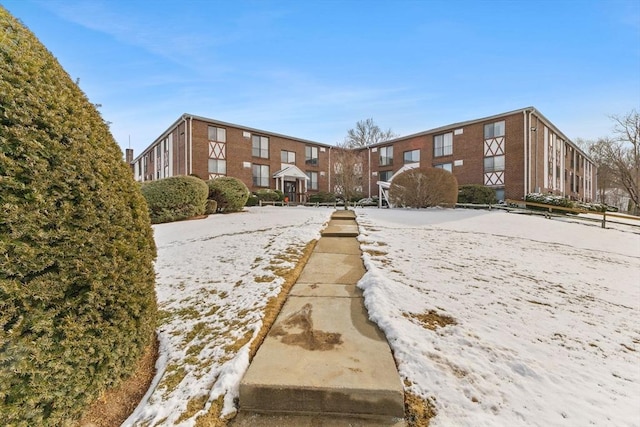 view of snow covered property