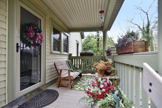 balcony featuring a porch