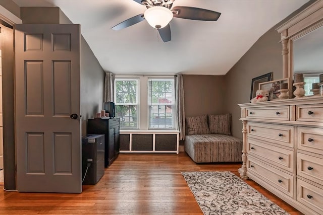 98 Moss St, New Bedford, MA 02744 - living area with vaulted ceiling, a ceiling fan, and light wood finished floors