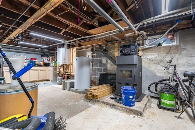 98 Moss St, New Bedford, MA 02744 - unfinished below grade area featuring water heater
