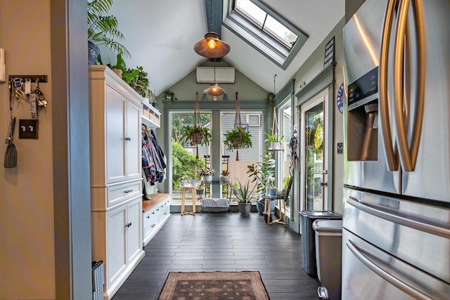 98 Moss St, New Bedford, MA 02744 - interior space with a skylight, plenty of natural light, dark wood finished floors, and lofted ceiling