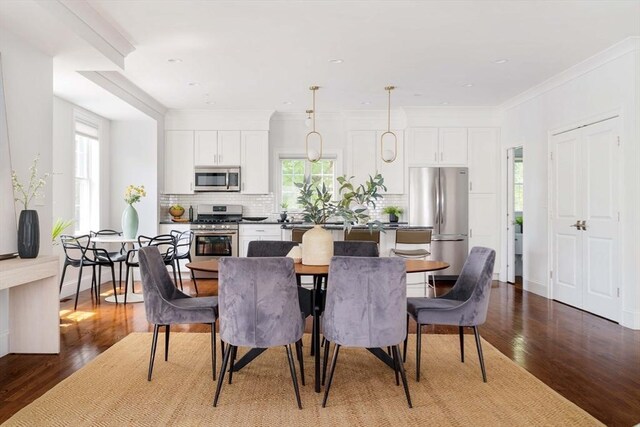 14 S Waverly St Unit 14, Boston, MA 02135 - dining room with healthy amount of natural light, dark wood-style flooring, and ornamental molding