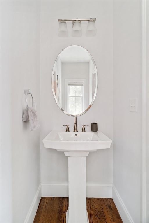 14 S Waverly St Unit 14, Boston, MA 02135 - bathroom featuring wood finished floors and baseboards