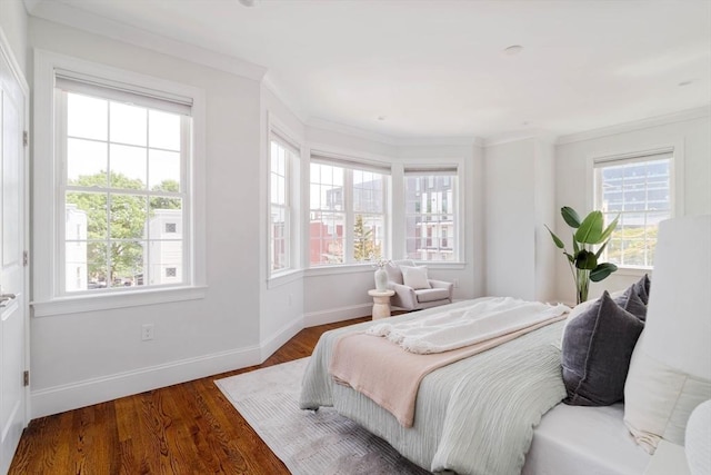14 S Waverly St Unit 14, Boston, MA 02135 - bedroom with crown molding, baseboards, and wood finished floors