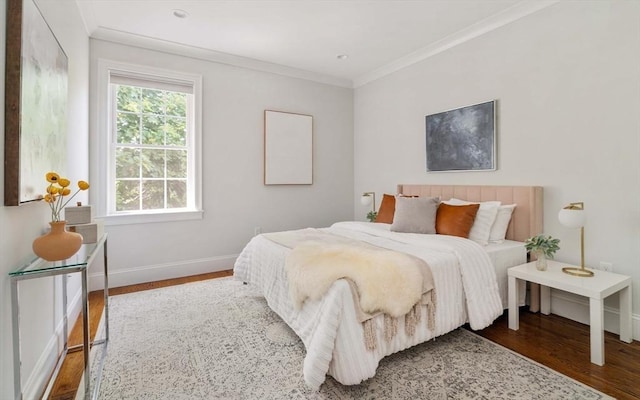14 S Waverly St Unit 14, Boston, MA 02135 - bedroom featuring wood finished floors, ornamental molding, and baseboards