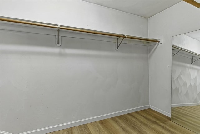 1 New Castle Rd, Ashland, MA 01721 - walk in closet featuring wood finished floors