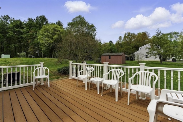 1 New Castle Rd, Ashland, MA 01721 - wooden terrace featuring a shed, an outbuilding, and a yard