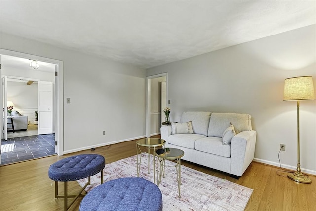 1 New Castle Rd, Ashland, MA 01721 - living area featuring wood finished floors and baseboards