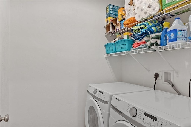 laundry room with separate washer and dryer