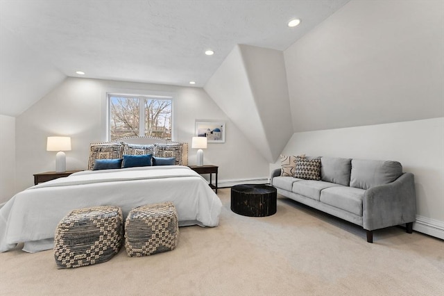 bedroom with a baseboard radiator, lofted ceiling, and carpet floors