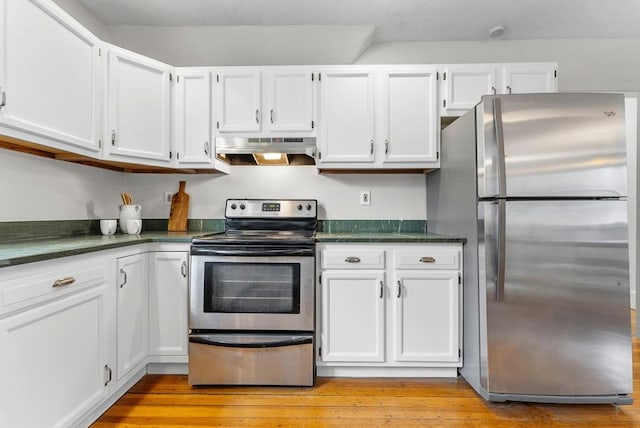 kitchen with stainless steel appliances, light hardwood / wood-style floors, and white cabinets